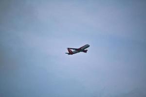 Manchester in the UK in October 2022. A Plane taking off from Manchester Airport photo