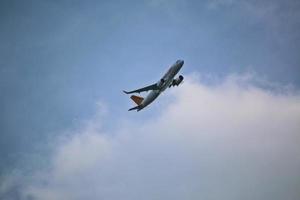 Manchester in the UK in October 2022. A Plane taking off from Manchester Airport photo