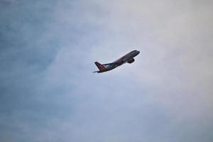 Manchester in the UK in October 2022. A Plane taking off from Manchester Airport photo