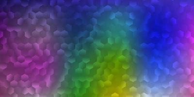 Light multicolor vector background with hexagonal shapes.