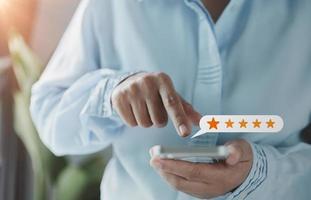 Customer service and Satisfaction concept, Customers are satisfied with services of a five-star business company, raising their rank or raising the highest ratings, best assessment and ranking idea. photo