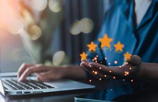 Customer service and Satisfaction concept, Customers are satisfied with services of a five-star business company, raising their rank or raising the highest ratings, best assessment and ranking idea. photo