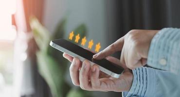 Customer service and Satisfaction concept, Customers are satisfied with services of a five-star business company, raising their rank or raising the highest ratings, best assessment and ranking idea. photo