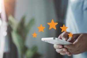 Customer service and Satisfaction concept, Customers are satisfied with services of a five-star business company, raising their rank or raising the highest ratings, best assessment and ranking idea. photo