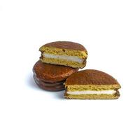 Delicious choco pies with marshmallow on white background. Classic snack cakes photo