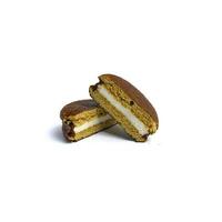 Delicious choco pies with marshmallow on white background. Classic snack cakes photo