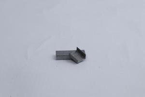 Stapler bullet isolated on white background photo