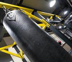 A closeup of a boxing punching bag in the sports complex photo