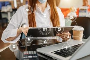 Hands of hr specialist browsing social networks in the Internet in smart phone to find the best candidates of success. Media VR icons. photo