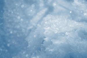 antecedentes. paisaje de invierno la textura de la nieve foto