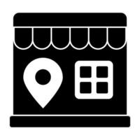 un ícono de diseño plano de la ubicación de la tienda vector