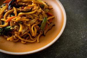 stir-fried yakisoba noodles with vegetable in vegan style photo