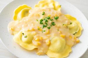 ravioli pasta with corn cheese sauce photo