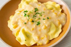 ravioli pasta with corn cheese sauce photo