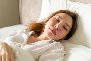 portrait beautiful woman sleeping on bed photo