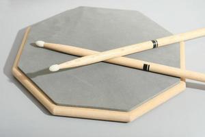 Percussion Instruments Music School, training pad and drumsticks. learning music, music education. photo