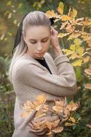 Young woman in forest photo