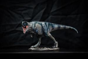 dinosaur , Giganotosaurus in the dark photo