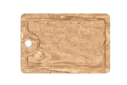 una vieja tabla de cortar de madera aislada sobre fondo blanco. foto