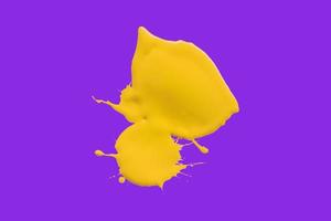 yellow brush isolated on purple background photo