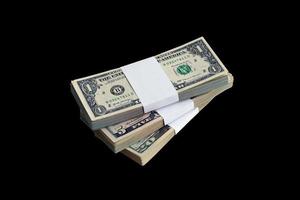 paquete de billetes de dólar estadounidense aislado en negro. paquete de dinero americano con alta resolución sobre fondo negro perfecto foto
