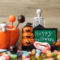 Happy Halloween day with ghost candies photo