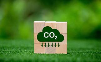 Net zero greenhouse gas emissions reduction with carbon credit concept. Reduce carbon dioxide e.g. renewable energy production improve the efficiency of transportation reduce environmental pollution. photo