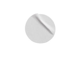 Blank white round paper sticker label isolated on white background with clipping path photo