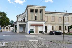 Tresigallo,Italy-may 2, 2021-view of Repubblic square in Tresigallo during a cloudy day photo