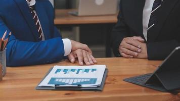 Businessman working with smart phone and laptop and digital tablet computer in office with digital marketing media in virtual icon video