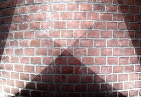 Aged and weathered brick wall textures with very bright spotlight illumination photo