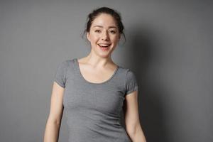 happy young woman with radiant smile photo