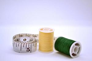 Threads and sewing ruler. photo