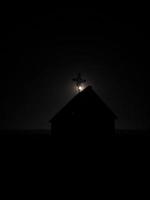 Orthodox church at night on a full moon photo