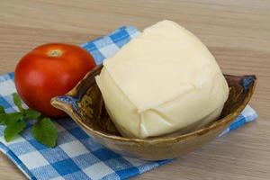 Mozzarella cheese on wood photo