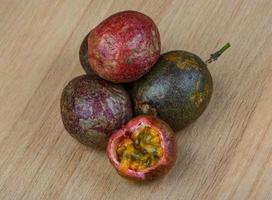 Passion Fruit on wood photo