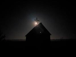 Orthodox church at night on a full moon photo