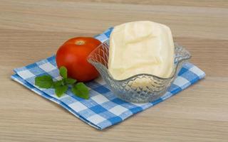 Mozzarella cheese on wood photo