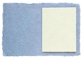 handmade paper with blank note isolated on white photo