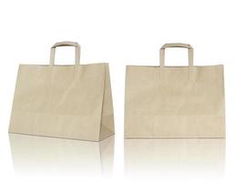 Brown paper bag on reflect floor and white background photo