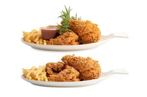 Fried chicken and potato chip served on white plate isolated on white background with clipping path, Junk food high calorie photo