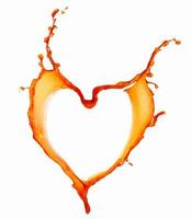 Heart shaped juice splash. photo