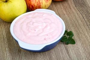 Strawberry yoghurt on wood photo