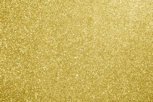 Abstract gold glitter sparkle bokeh light background photo