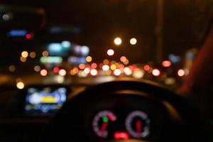 Abstract night traffic blur background with bokeh light photo