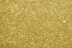 Abstract gold glitter sparkle background photo