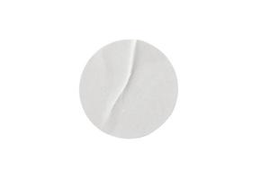 Blank white round paper sticker label isolated on white background with clipping path photo