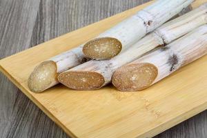 Sugar sticks on wood photo