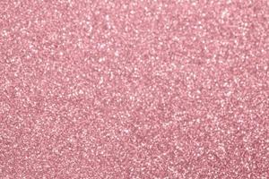 Abstract blur rose gold glitter sparkle defocused bokeh light background photo
