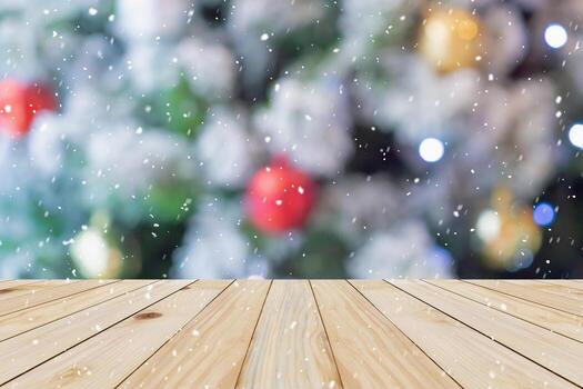 Empty wood table top with Abstract blur Christmas tree with decoration bokeh light background for product display photo